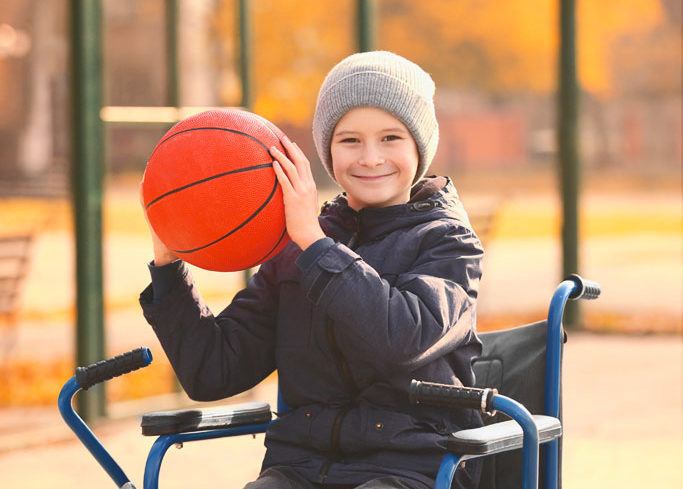 a boy playing basketball