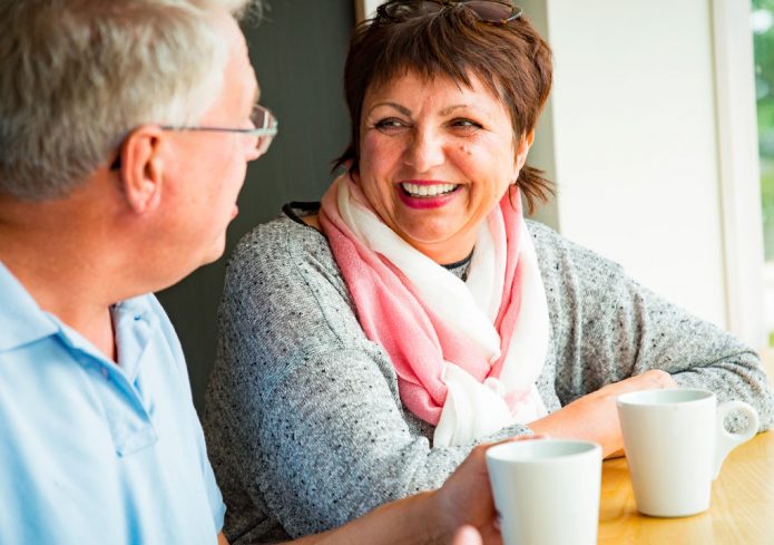 A man and lady having a coffee