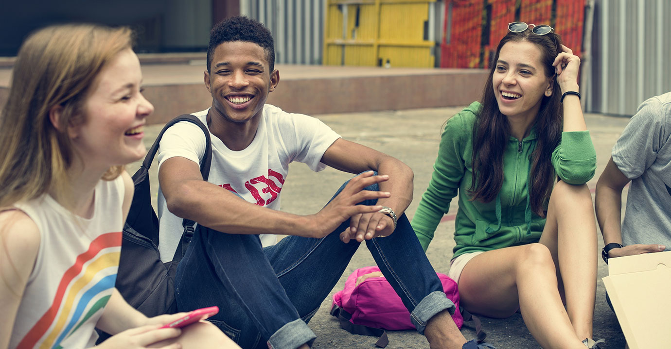 Group of young people sat together