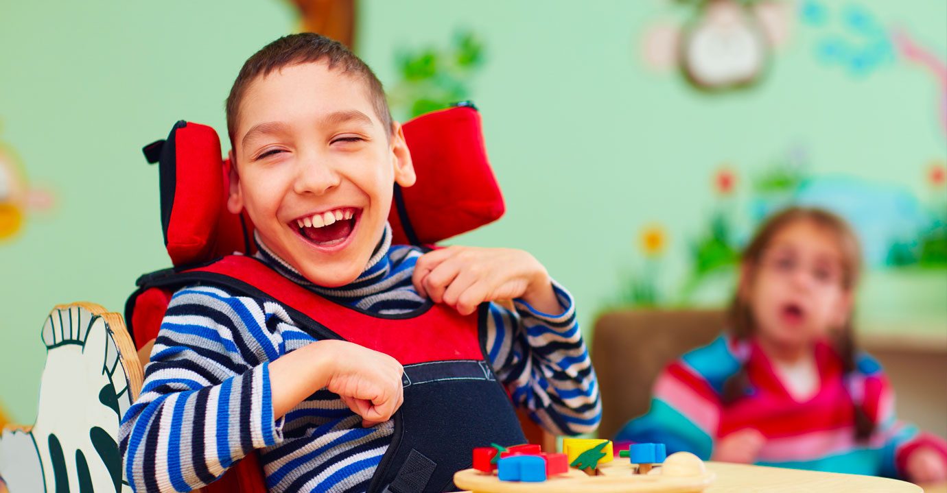 A boy smiling at the camera