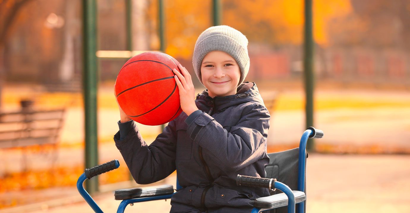 a boy playing basketball