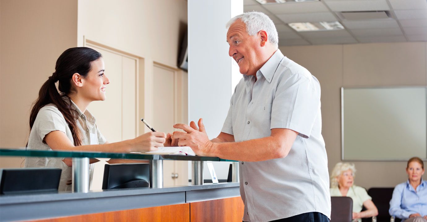 A man seeking advice at a desk