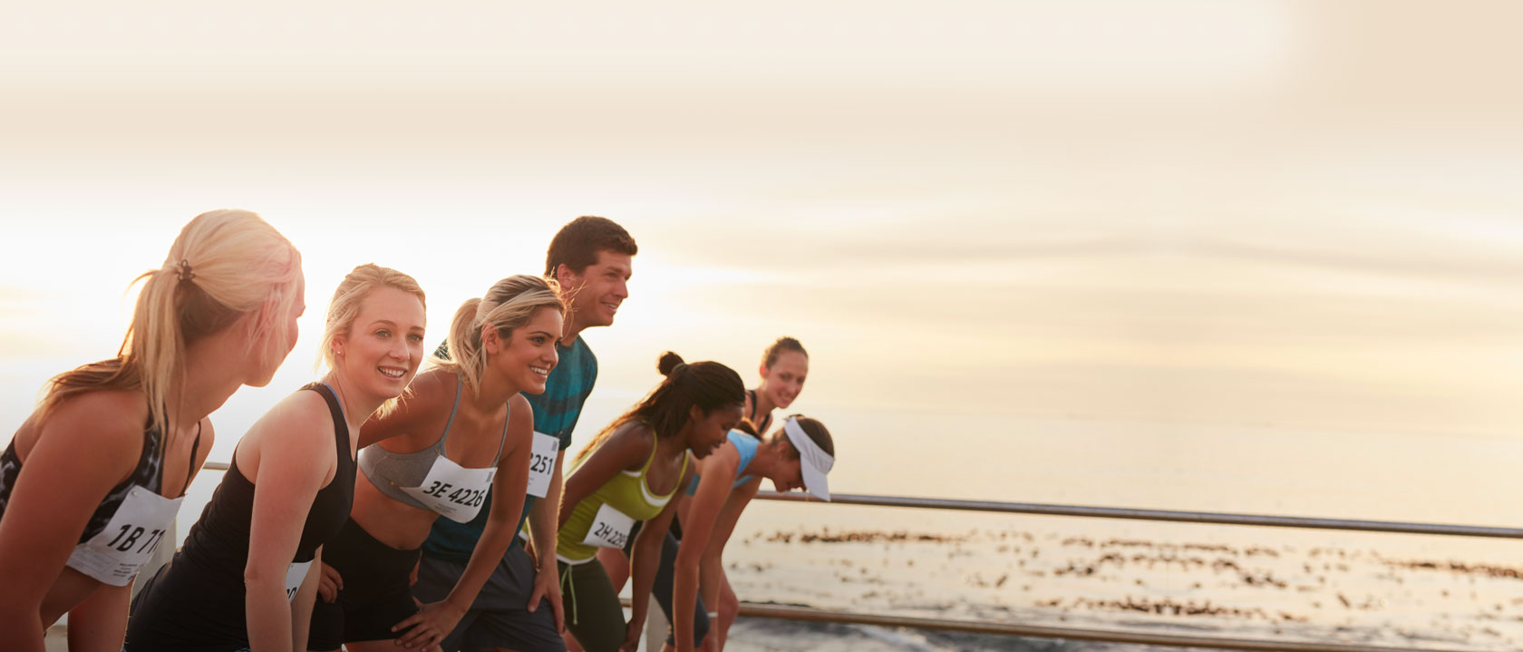 Group of people running to at an event