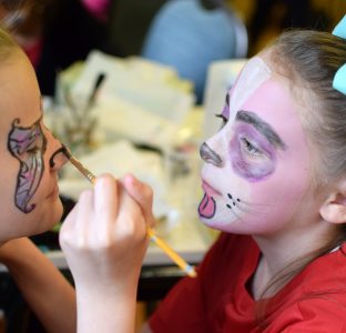 Face painting each other