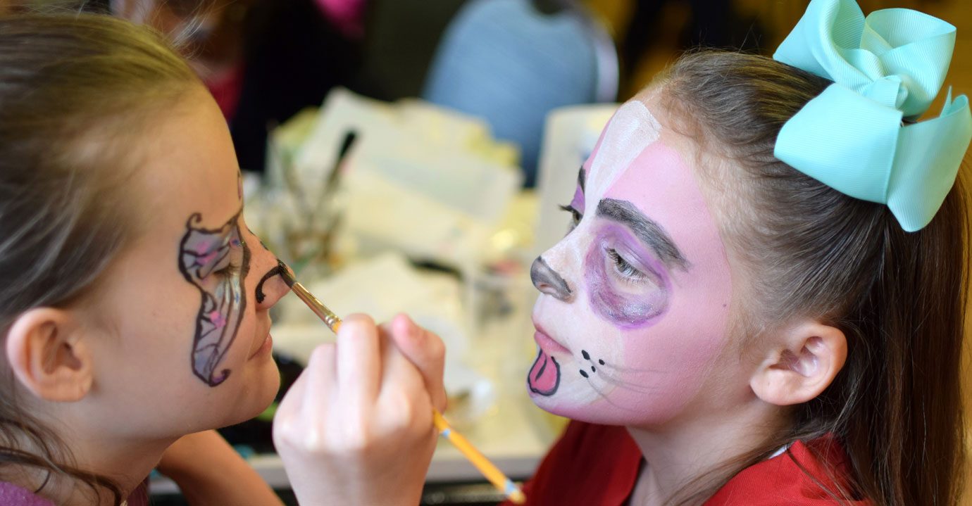 Face painting each other