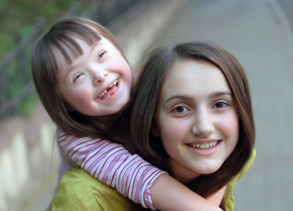 Young carer with sister